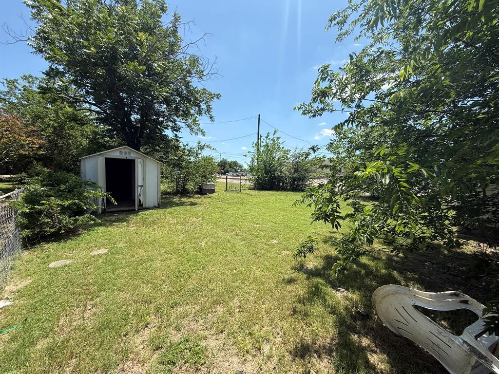 1724 McFerrin Avenue Waco, TX 76708 - Photo 11 of 11 a backyard of a house with lots of green space