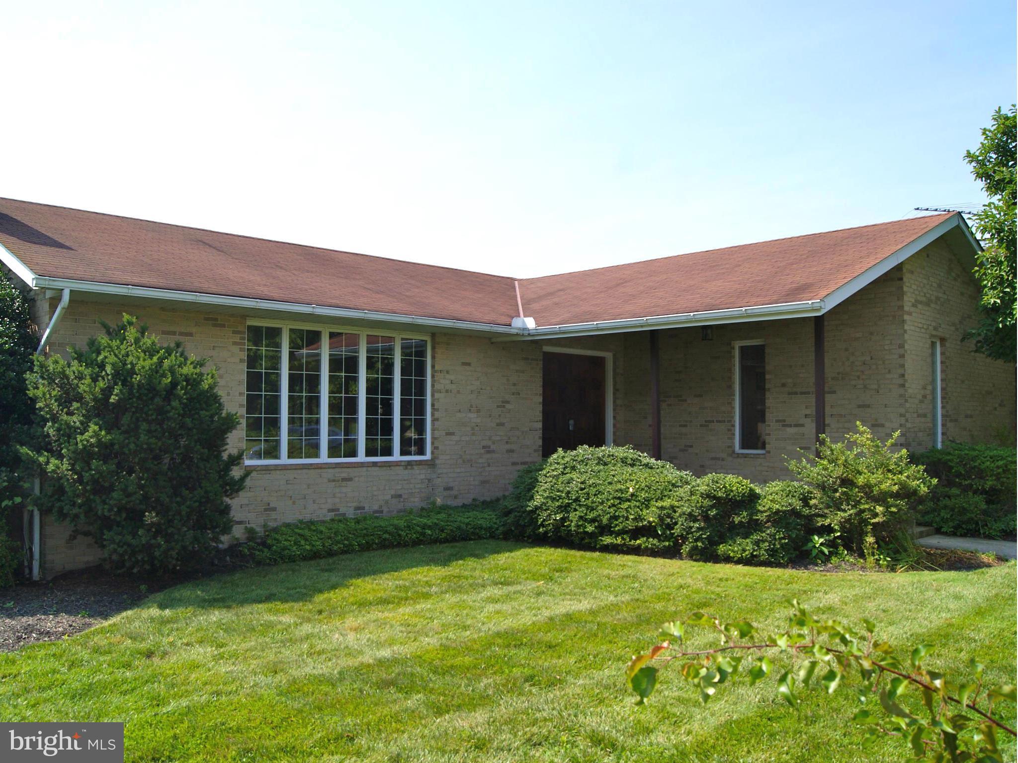 9221 Cornflower Road Baltimore, MD 21236 - Photo 1 of 25 front view of a house with a yard