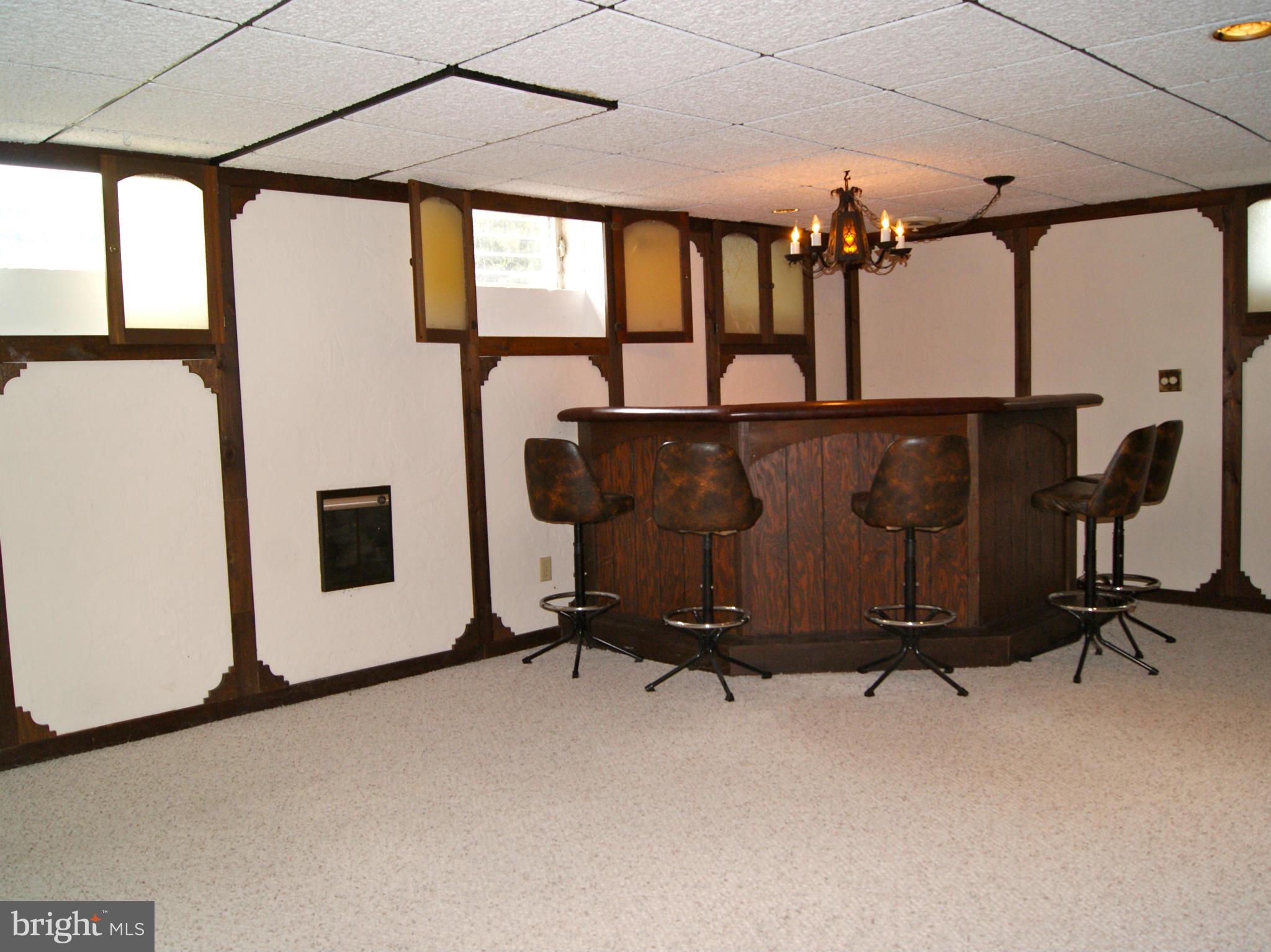 9221 Cornflower Road Baltimore, MD 21236 - Photo 22 of 25 a view of a room with gym equipment