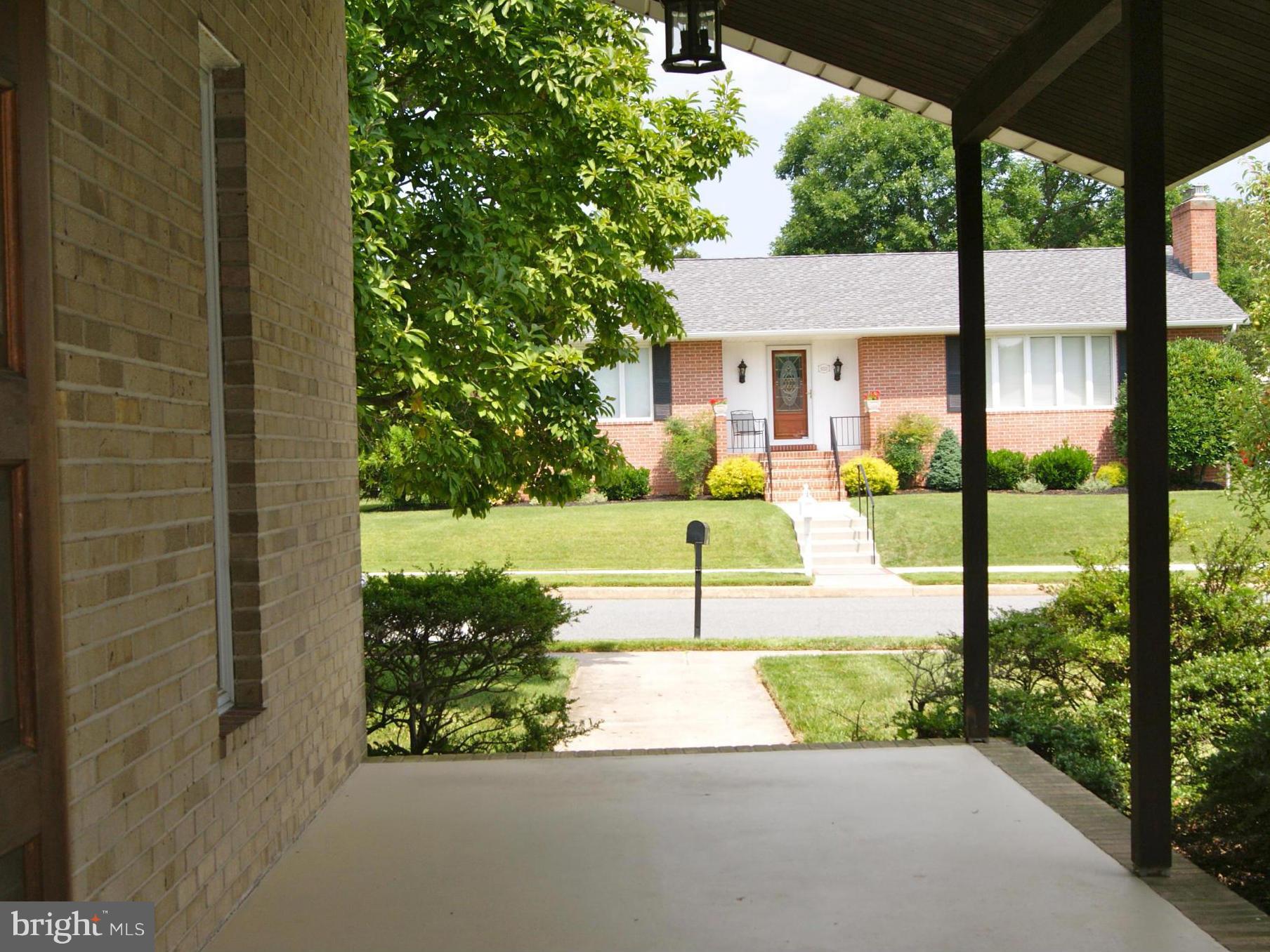 9221 Cornflower Road Baltimore, MD 21236 - Photo 6 of 25 a view of a house with backyard and garden