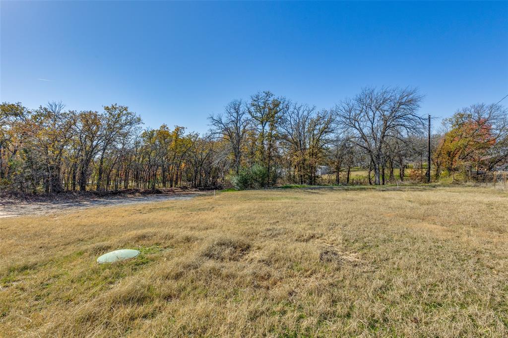 445 Arvel Circle Azle, TX 76020 - Photo 25 of 25 a view of outdoor space with trees
