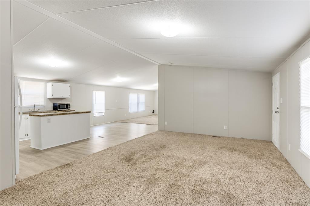 445 Arvel Circle Azle, TX 76020 - Photo 6 of 25 a view of kitchen with white cabinets