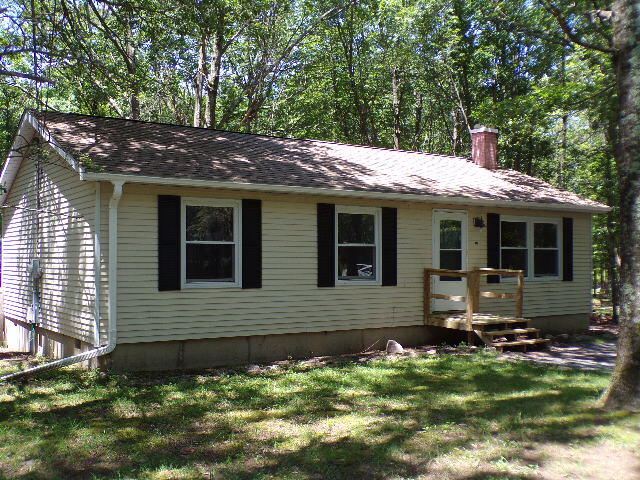 101 Mohawk Trail Albrightsville, PA 18210 - Photo 1 of 16 a front view of a house with a yard