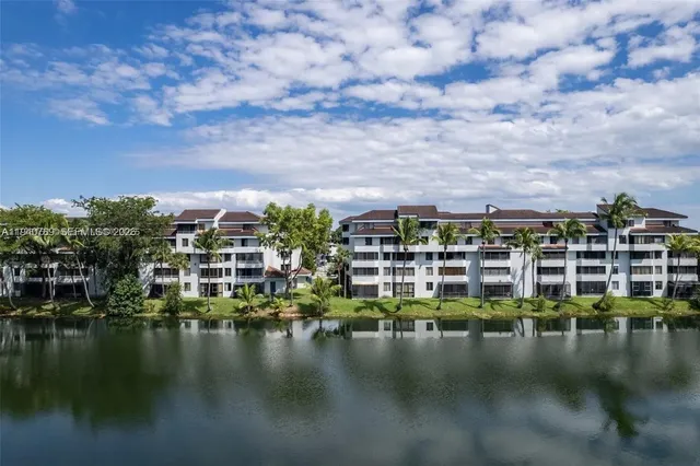 a view of residential houses with outdoor space