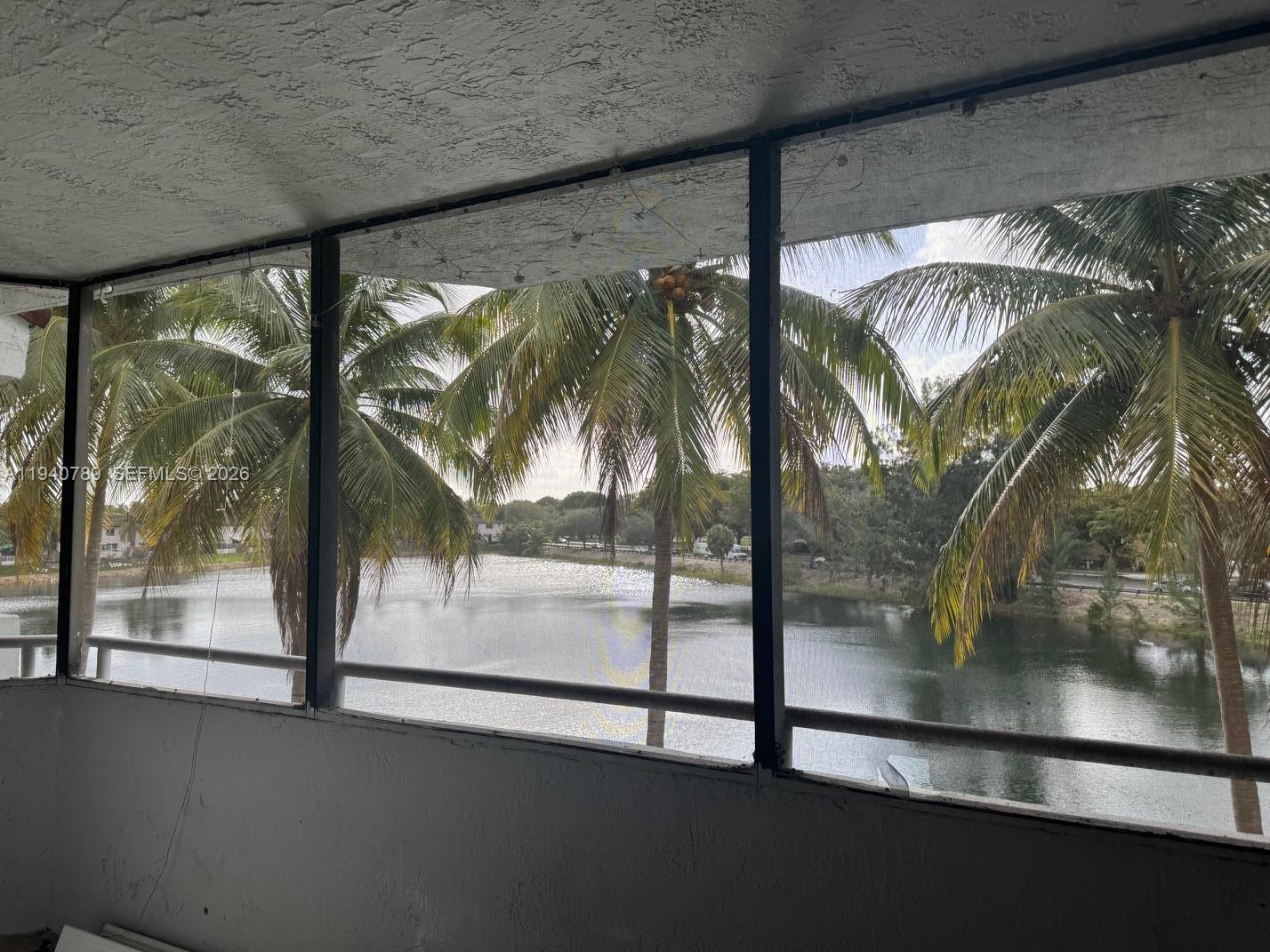 8335 Southwest 152nd Avenue, Unit B309 Miami, FL 33193 - Photo 26 of 26 a view of outdoor space with seating area