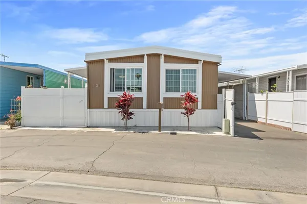 front view of a house with a patio