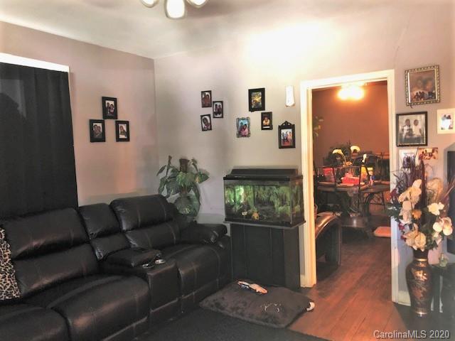 131 Marigold Street Rockingham, NC 28379 - Photo 4 of 8 a living room with furniture and a flat screen tv