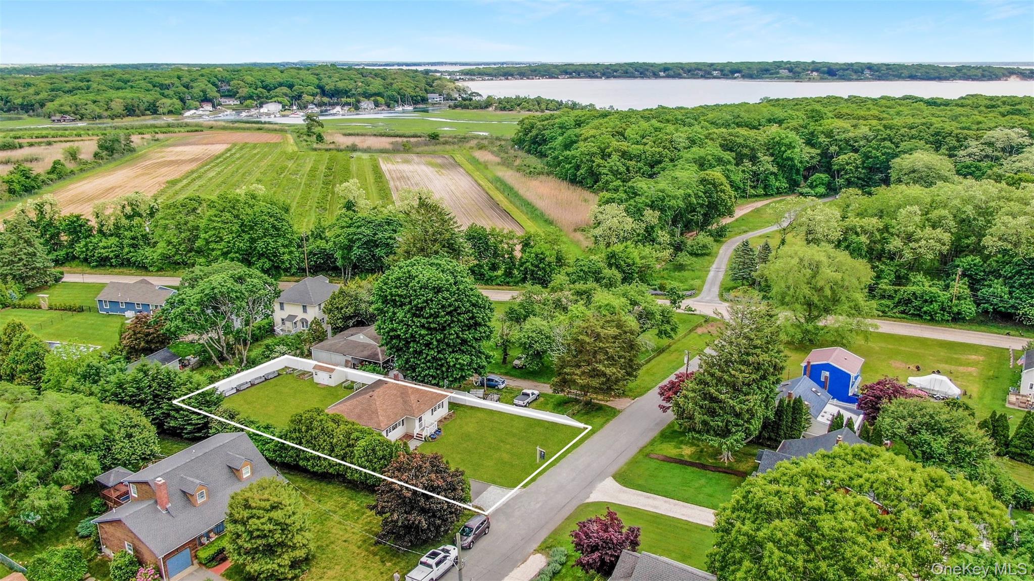 315 Wicks Road New Suffolk, NY 11956 - Photo 2 of 28 an aerial view of a house