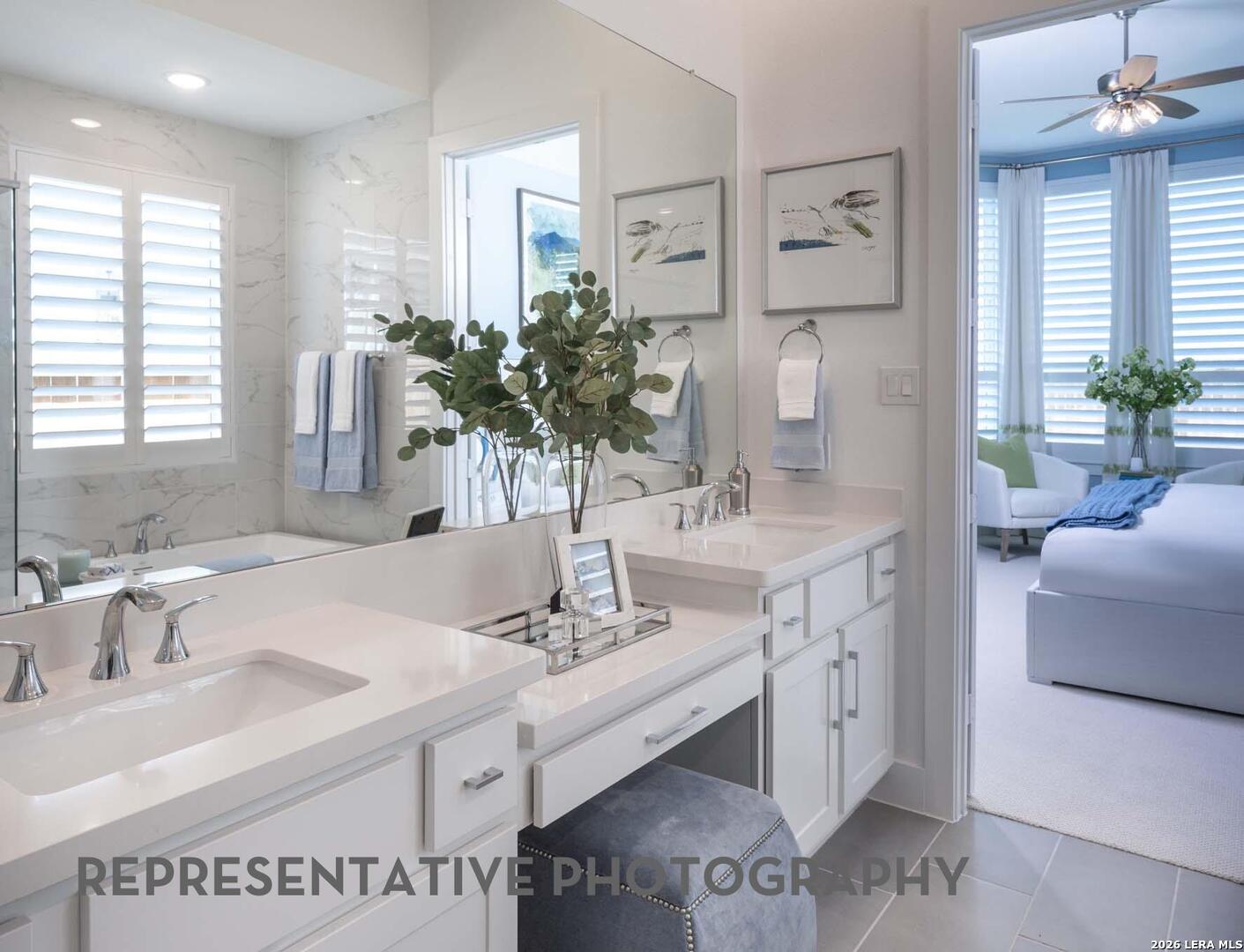 237 Boulder Creek Boerne, TX 78006 - Photo 16 of 32 a bathroom with a sink double vanity and a mirror