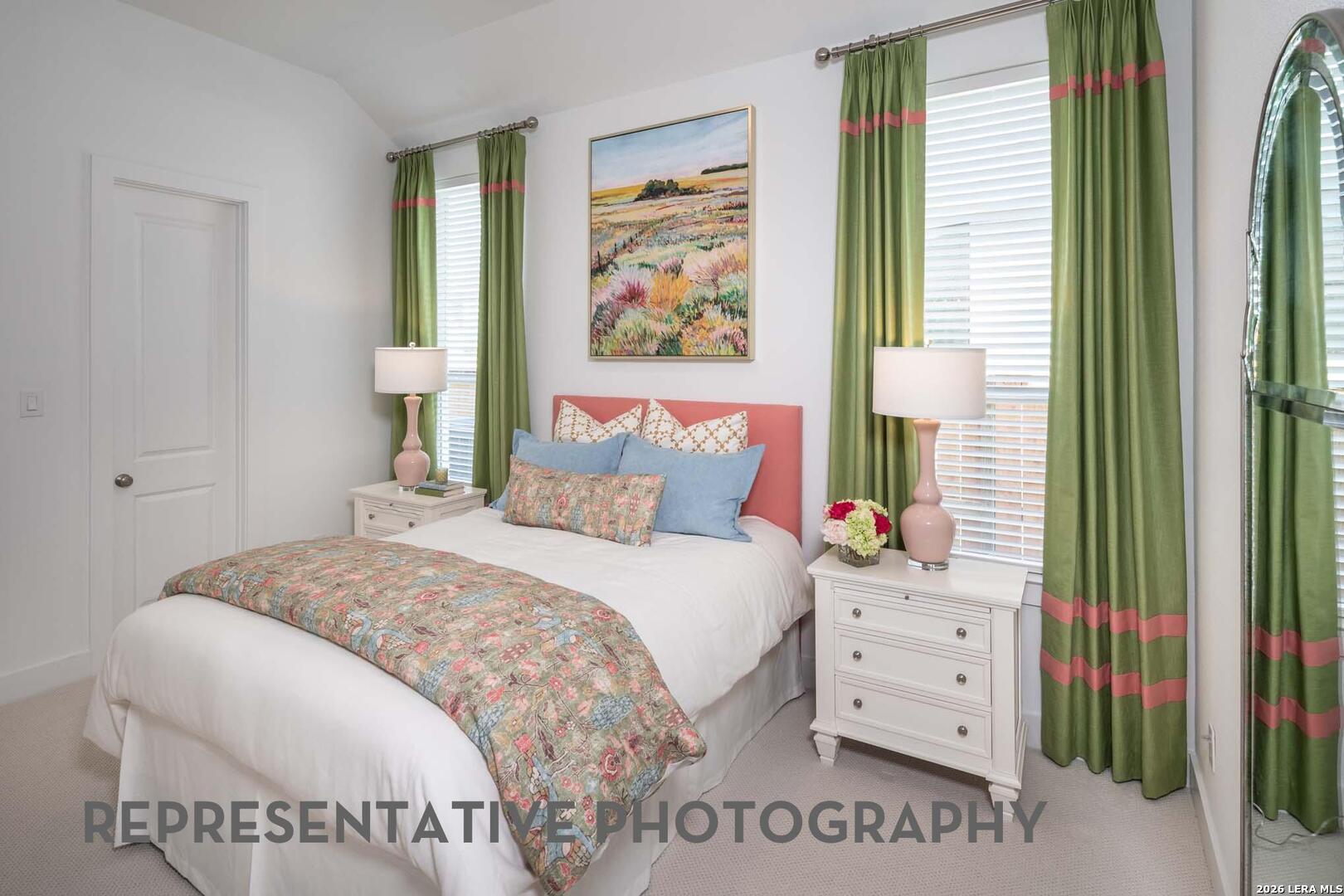 237 Boulder Creek Boerne, TX 78006 - Photo 24 of 32 a bedroom with a bed and a dresser