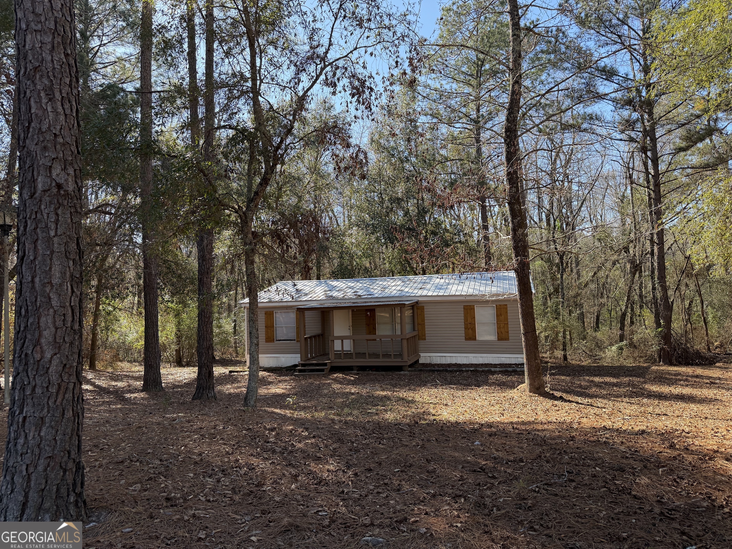 927 Louis Road Rentz, GA 31075 - Photo 2 of 22 a view of house with a yard