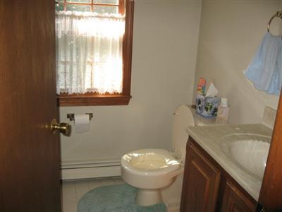 46 Pilgrim Road Harwich Port, MA 02646 - Photo 14 of 17 a bathroom with a sink a toilet and tub