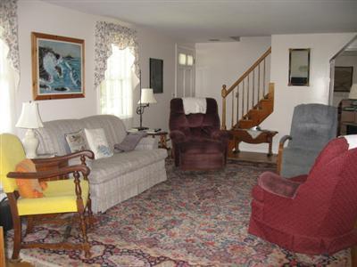 46 Pilgrim Road Harwich Port, MA 02646 - Photo 7 of 17 a living room with furniture and a window