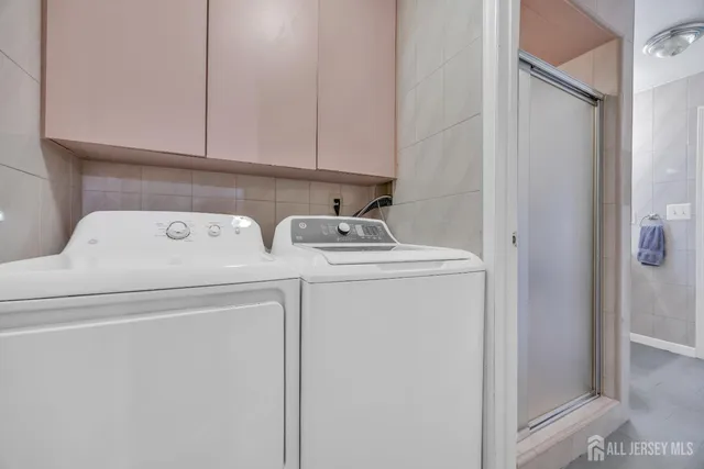 a utility room with dryer and washer