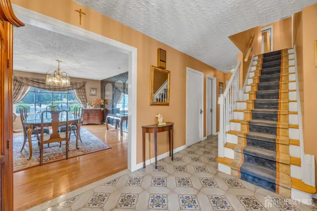 a view of a living room and dining room