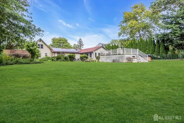 a view of a house with a big yard