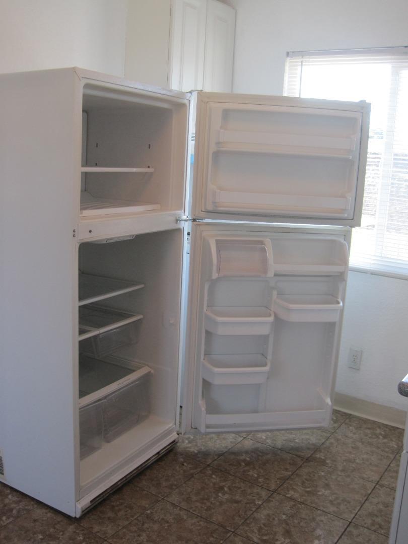 1225 Beacon Avenue San Mateo, CA 94401 - Photo 7 of 21 a refrigerator in a kitchen