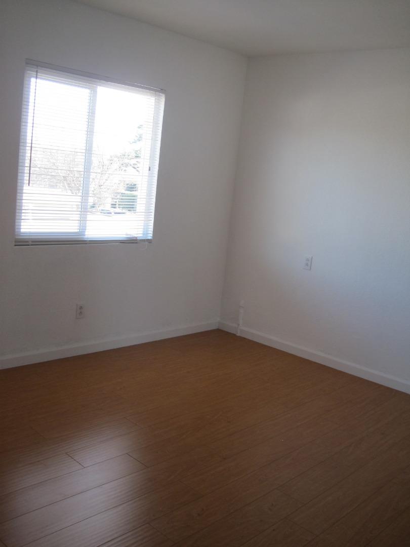 1225 Beacon Avenue San Mateo, CA 94401 - Photo 9 of 21 an empty room with a window