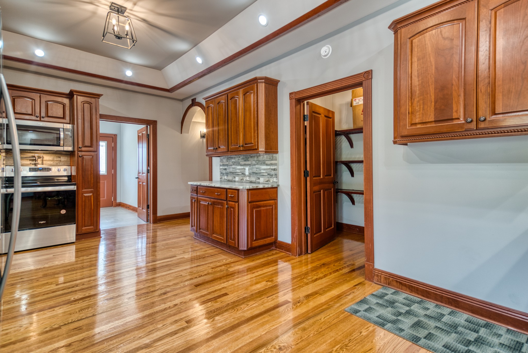315 Blue And Gray Park Road Elkton, KY 42220 - Photo 35 of 66 a view of kitchen with cabinets and wooden floor