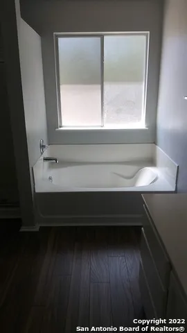 an empty room that has a window