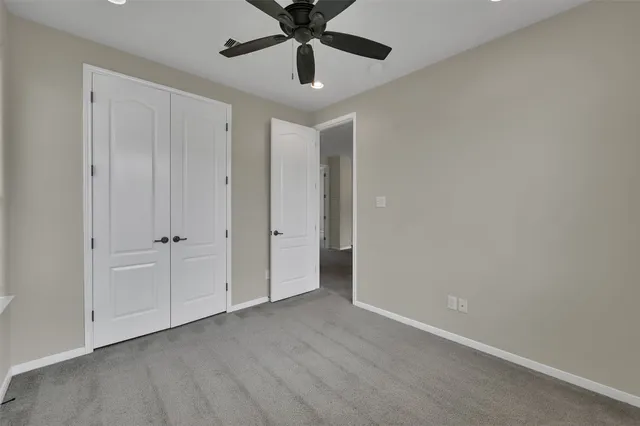 an empty room with a bathroom