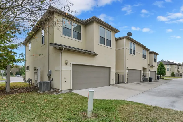 a swimming pool with outdoor seating and yard