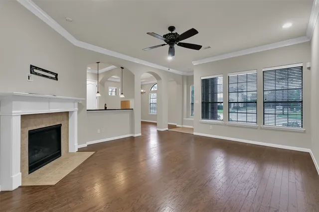 a view of a kitchen with stainless steel appliances granite countertop a refrigerator and a sink