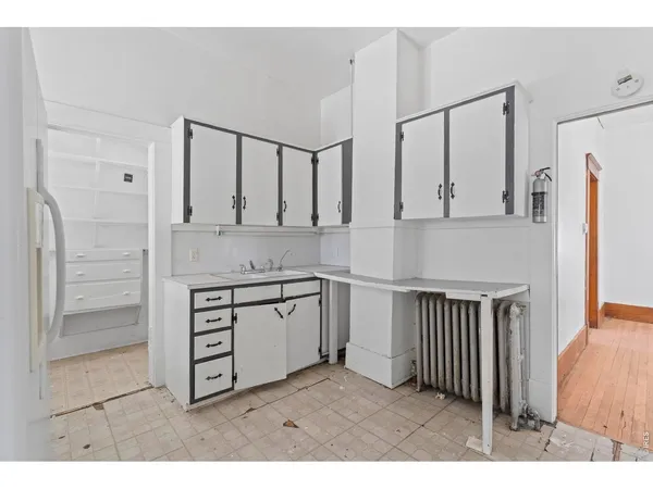 a bathroom with a sink a bathtub and a shower