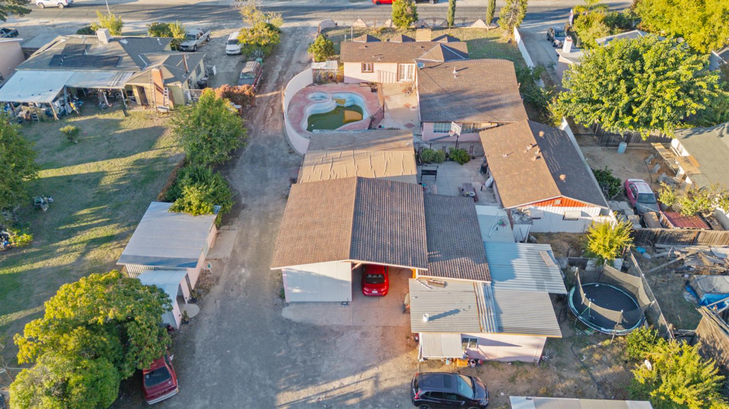 7685 Walnut Avenue Winton, CA 95388 - Photo 12 of 16 an aerial view of residential houses with outdoor space