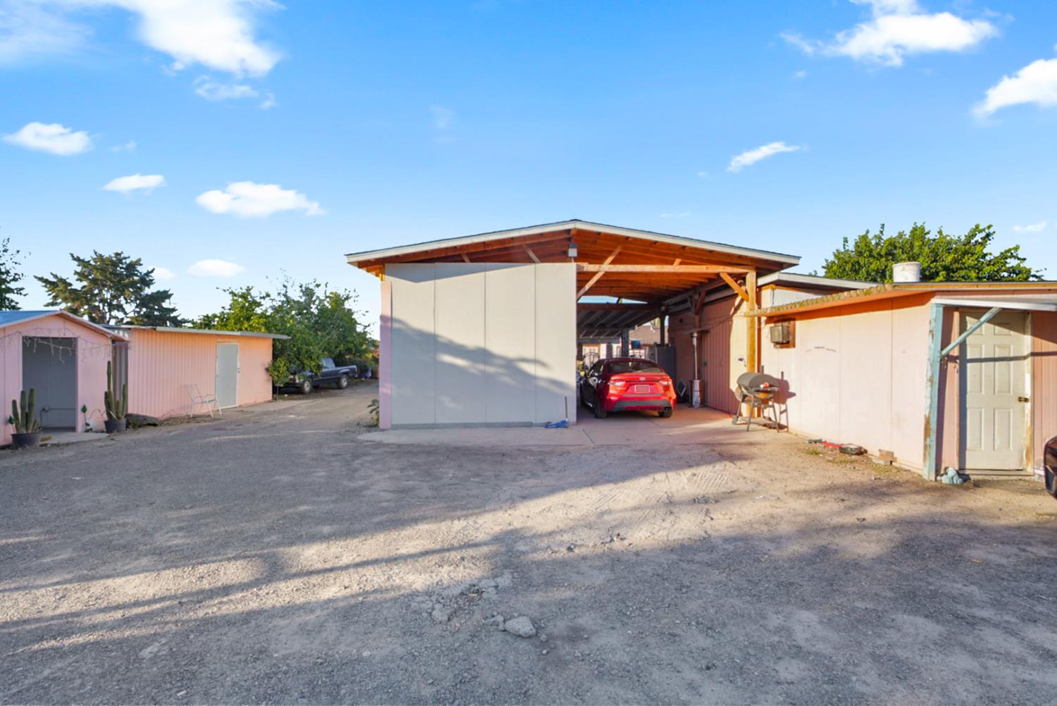 7685 Walnut Avenue Winton, CA 95388 - Photo 10 of 16 a view of a car park in front of house