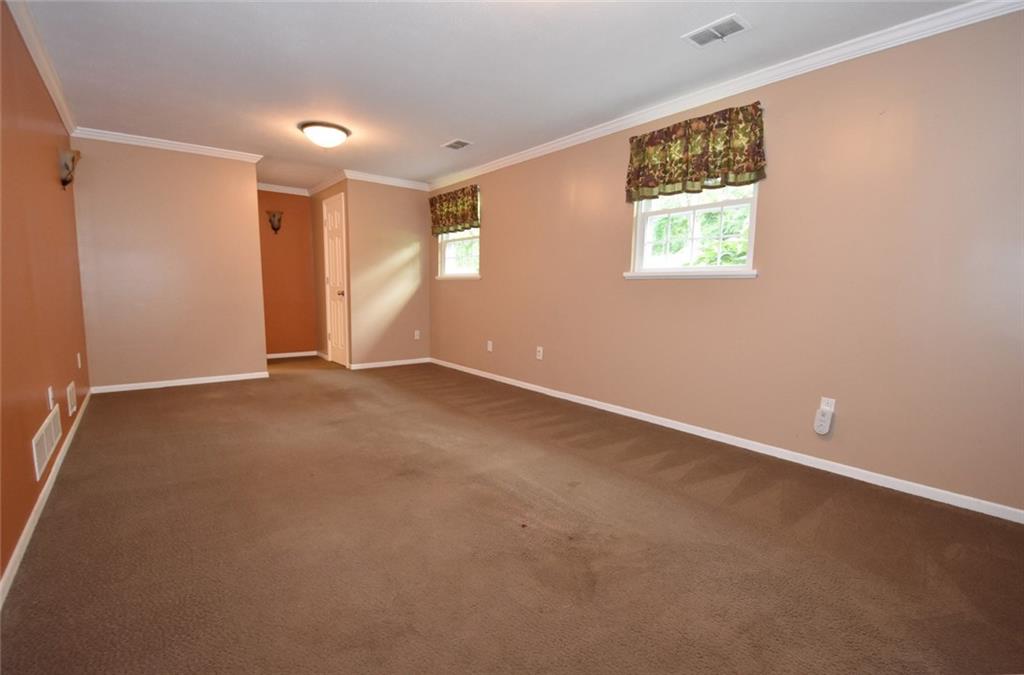 2356 Cramden Road Pittsburgh, PA 15241 - Photo 18 of 25 The first level roomy family room is 25' x 12' with a 1/2 bath that is updated and adjacent. Plus a closet too! So much space. This room offers a great space for those family gatherings. Easy access to the eat-in-kitchen, lower level family room and over-sized 2 car garage.