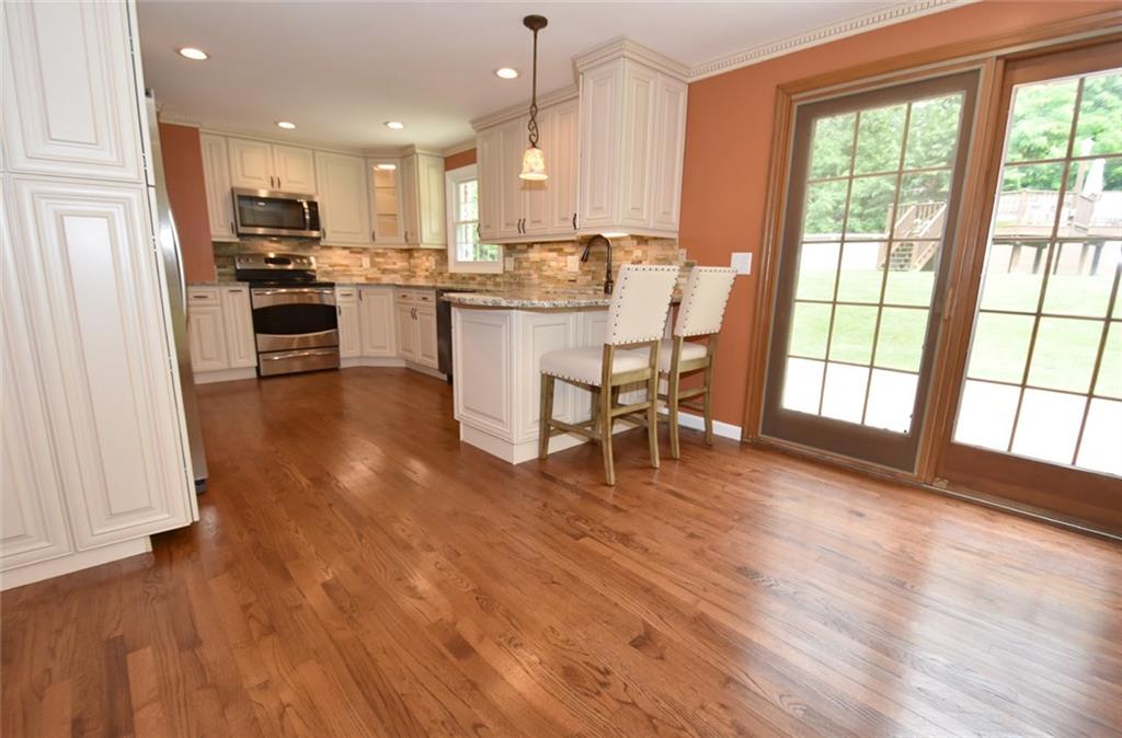 2356 Cramden Road Pittsburgh, PA 15241 - Photo 8 of 25 The cooks dream eat-in-kitchen! Custom designed, new top of the line stainless steel appliances, easy access to the level two-tiered back yard and eating area! What are you waiting for, make your offer today.