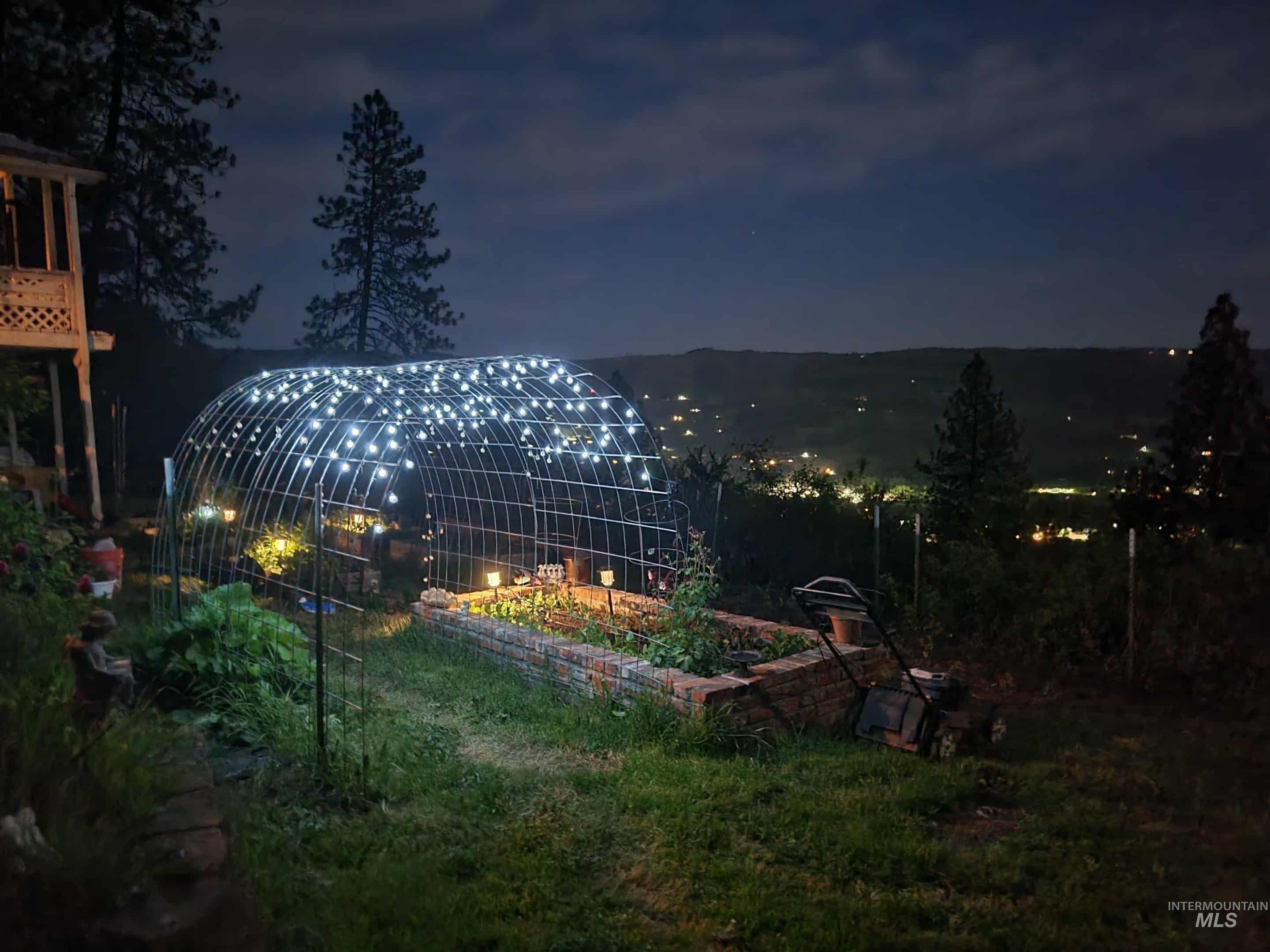 3230 Highway 64 Kamiah, ID 83536 - Photo 12 of 50 Yard at twilight with a vegetable garden