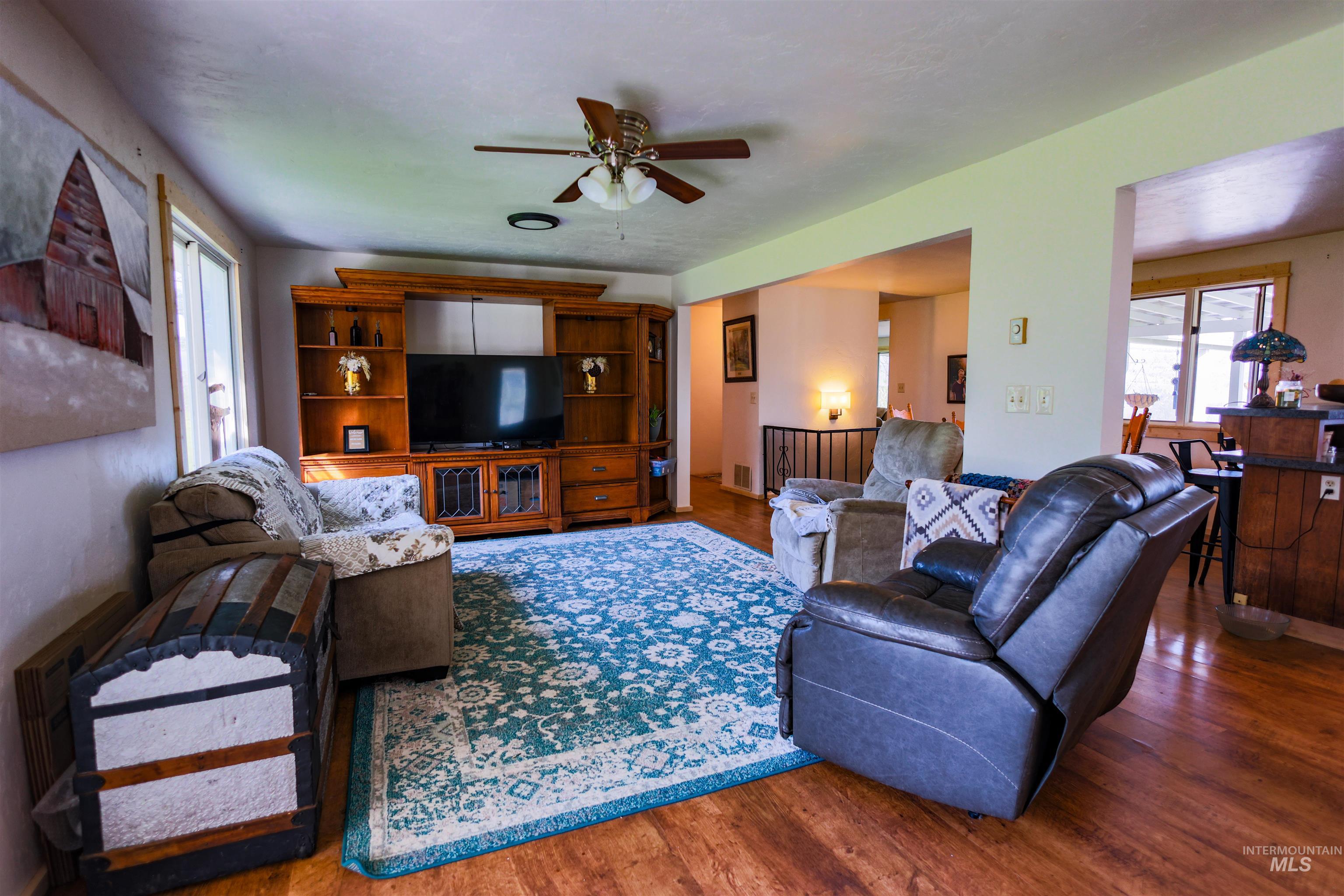 3230 Highway 64 Kamiah, ID 83536 - Photo 34 of 50 Living room with wood finished floors and ceiling fan