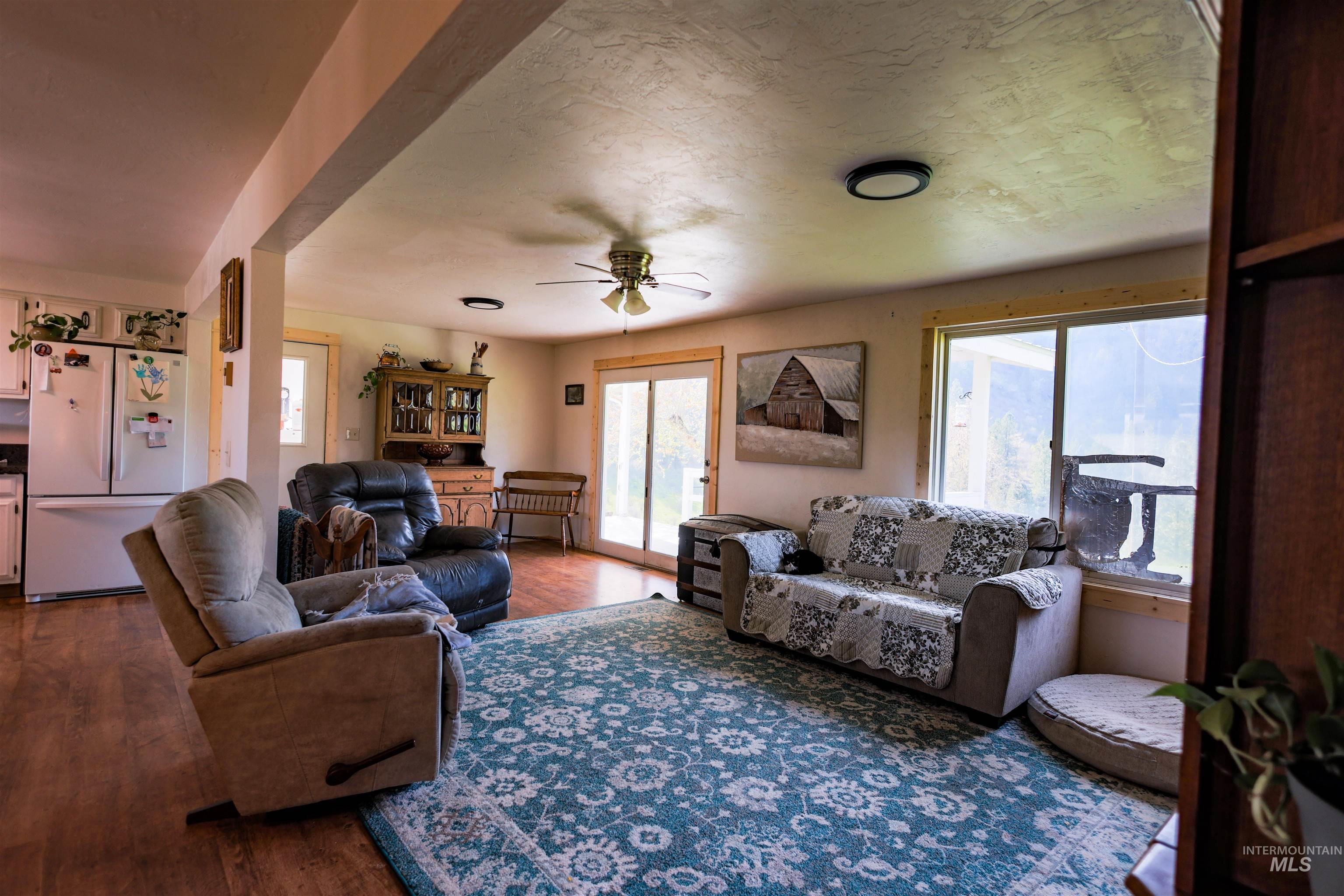 3230 Highway 64 Kamiah, ID 83536 - Photo 35 of 50 Living room with wood finished floors and ceiling fan
