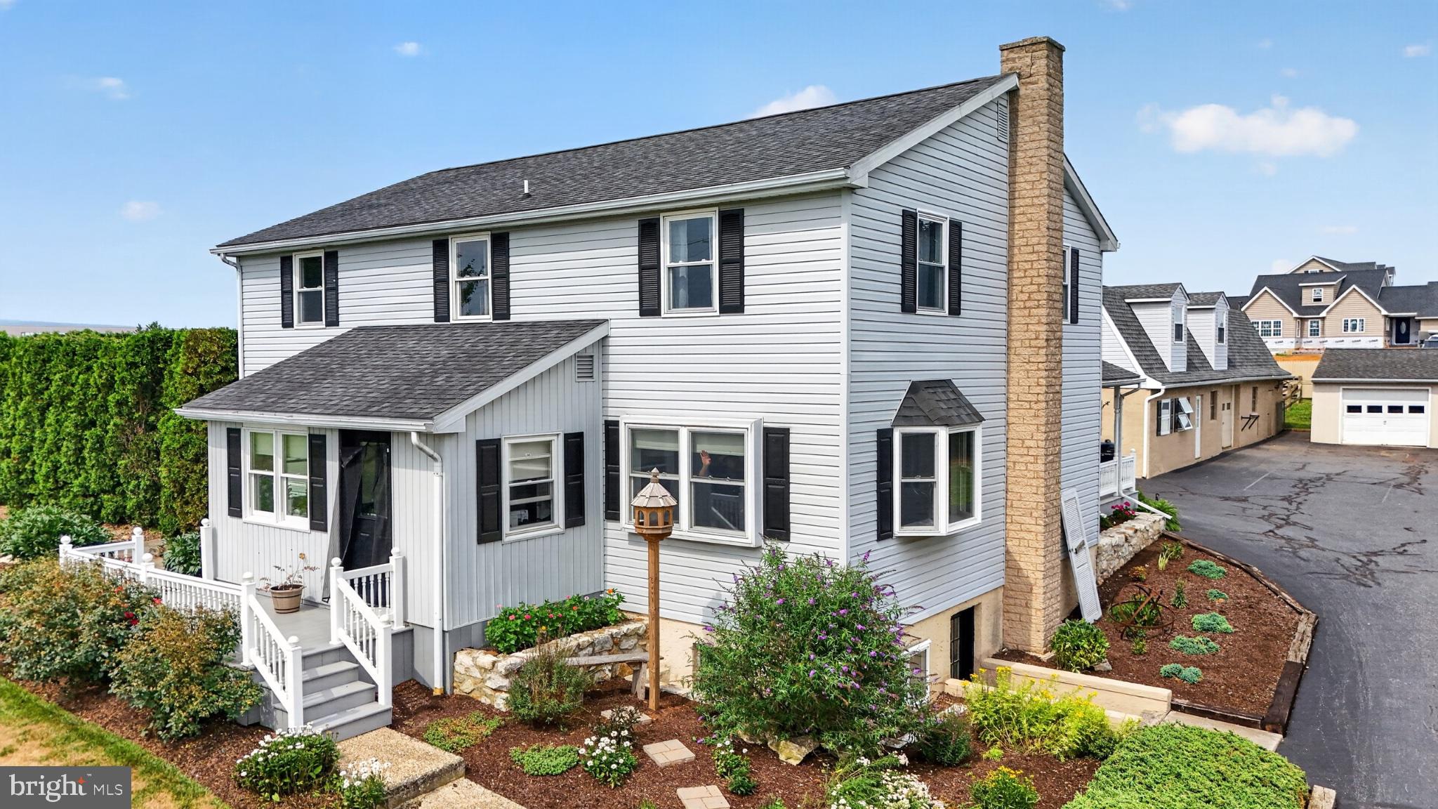 285 School Lane Road Gap, PA 17527 - Photo 1 of 56 Charming two-story home with lush gardens.