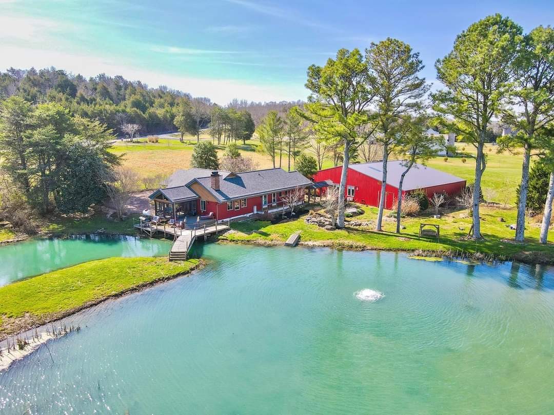 a view of an ocean with a swimming pool