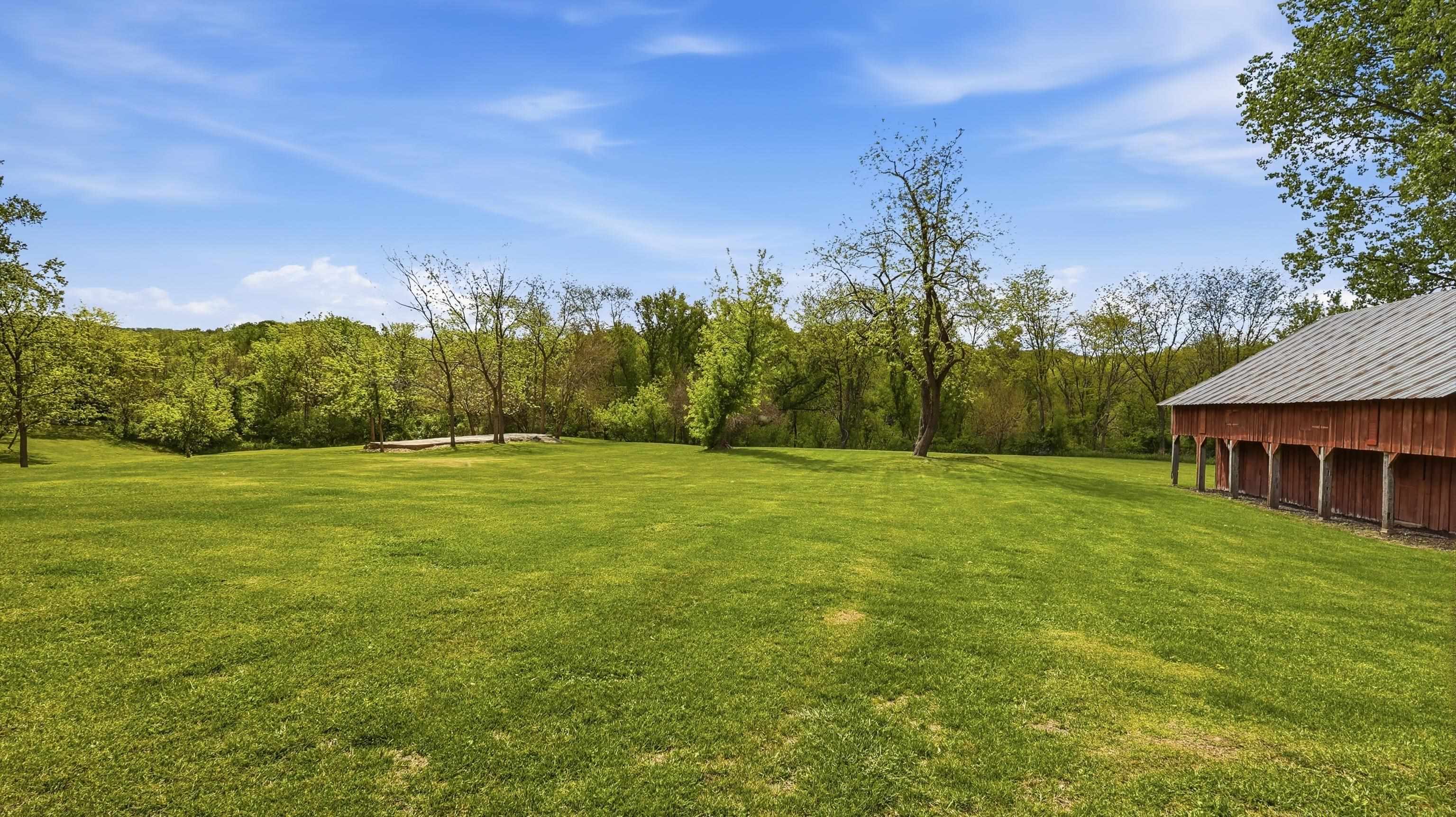 2562 West Blackjack Road Galena, IL 61036 - Photo 61 of 75 a view of a house with a yard
