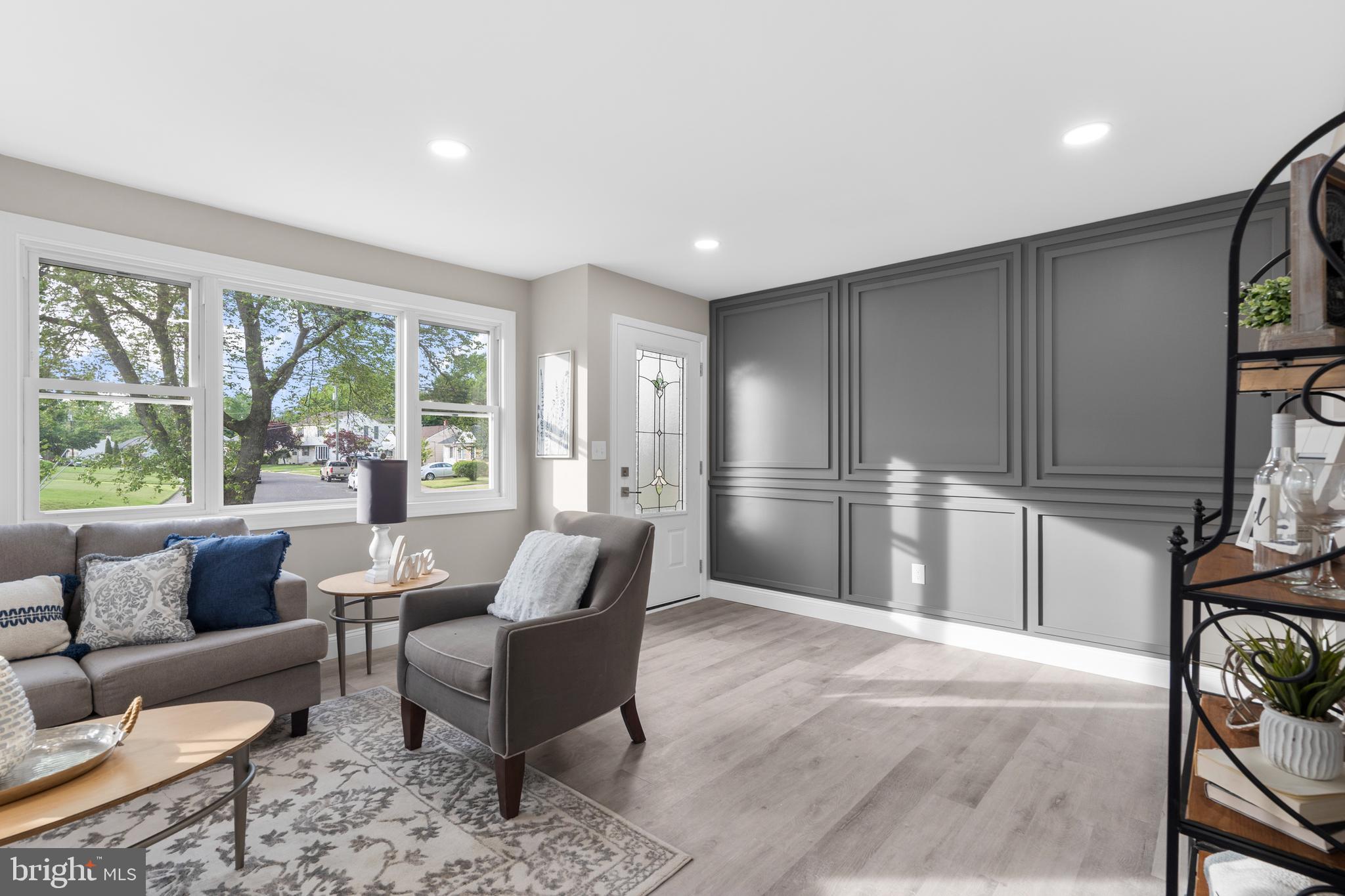 1 Gainor Avenue Maple Shade, NJ 08052 - Photo 8 of 27 a living room with furniture and a fireplace