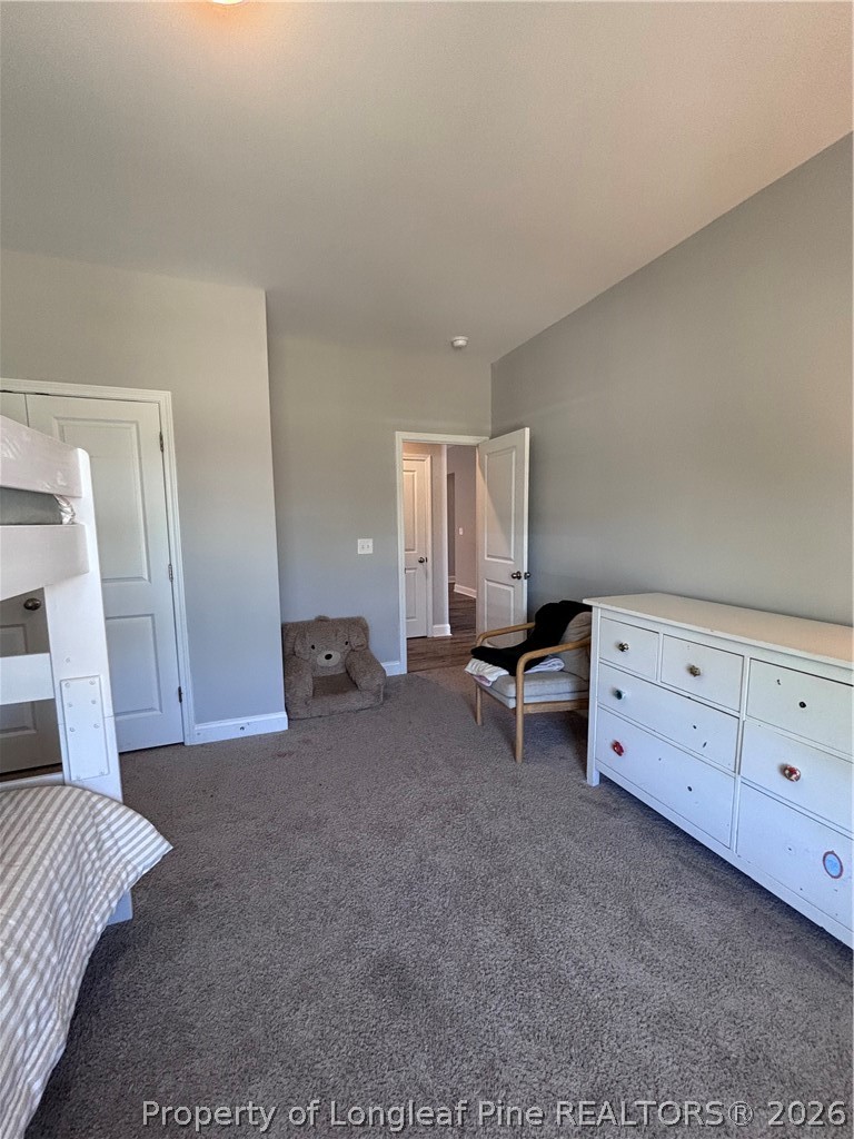 7720 Rufus Johnson Road Fayetteville, NC 28306 - Photo 9 of 50 a view of room with couch and windows