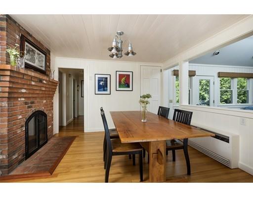 45 Gibson Road Orleans, MA 02653 - Photo 13 of 29 a view of a dining room with furniture window and wooden floor