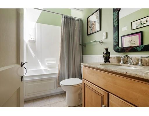 45 Gibson Road Orleans, MA 02653 - Photo 15 of 29 a bathroom with a granite countertop sink toilet and a mirror