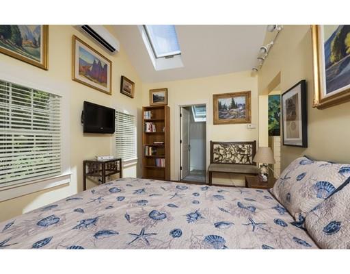 45 Gibson Road Orleans, MA 02653 - Photo 17 of 29 a bedroom with a bed and a flat screen tv