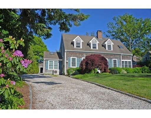 45 Gibson Road Orleans, MA 02653 - Photo 25 of 29 a front view of a house with a garden
