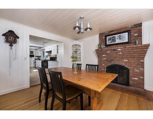 45 Gibson Road Orleans, MA 02653 - Photo 6 of 29 a view of a dining room with furniture and wooden floor