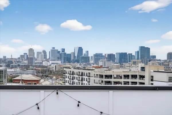 a view of city with tall buildings