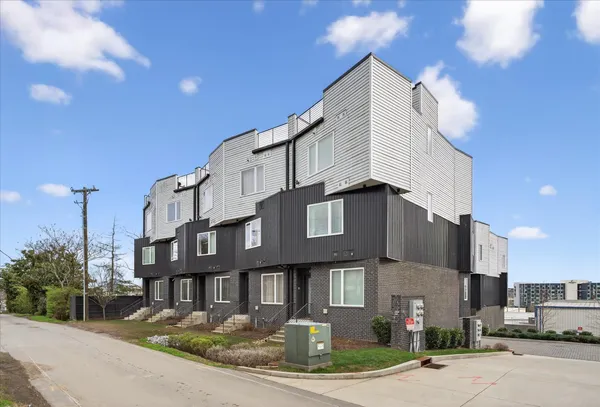 a front view of a building with street view