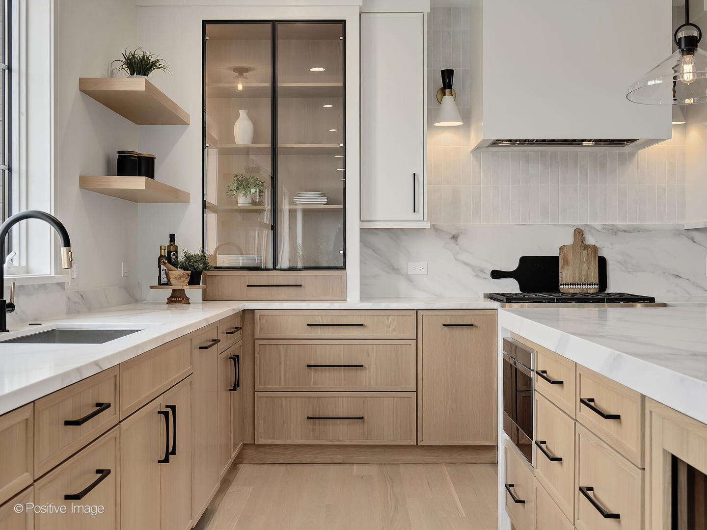 8302 Pleasant View Avenue Willow Springs, IL 60527 - Photo 11 of 45 a kitchen with cabinets appliances a sink and a window