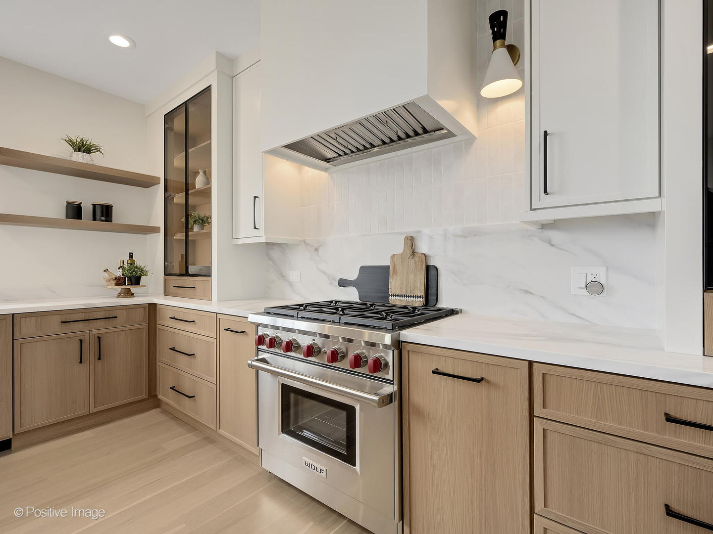 8302 Pleasant View Avenue Willow Springs, IL 60527 - Photo 18 of 45 a kitchen with white cabinets and appliances