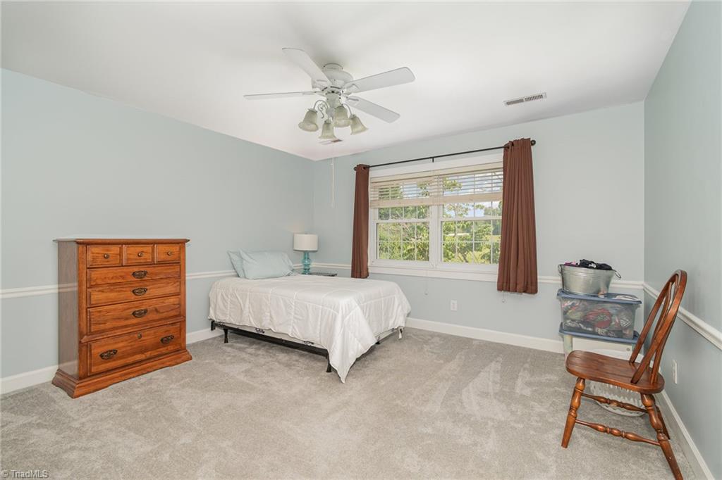 7801 Robinson Road Summerfield, NC 27358 - Photo 21 of 30 One of the large bedrooms on 2nd floor.